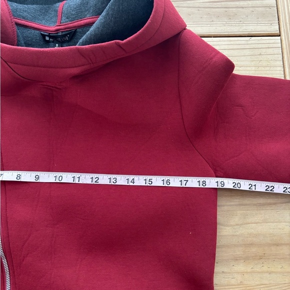 Red Utility Jacket with Asymmetrical Zipper and Minimalist Design - Picture 9 of 12